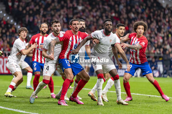 2024-02-07 - Stefan Savic of Atletico Madrid fighting for the position against Aitor Paredes and Inaki Williams of Athletic Bilbao during the football match valid for the semi-final of the Copa del Rey tournament between Atletico Madrid and Athletic Bilbao played at Estadio Metropolitano in Madrid, Spain. - ATLETICO MADRID VS ATHLETIC BILBAO - SPANISH CUP - SOCCER