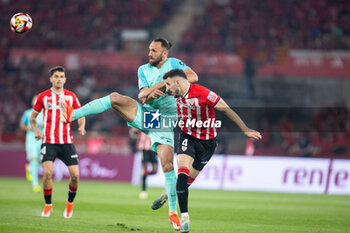 2024-04-06 - Vedat Muriqi of RCD Mallorca and Aitor Paredes of Athletic Club during the Spanish Cup, Copa del Rey, Final football match between Athletic Club and RCD Mallorca on April 6, 2024 at La Cartuja stadium in Sevilla, Spain - FOOTBALL - SPANISH CUP - FINAL - ATHLETIC CLUB V MALLORCA - SPANISH CUP - SOCCER