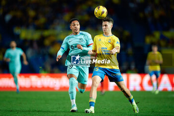 2024-01-04 - Vitor Roque of FC Barcelona and Mika Marmol of Las Palmas during the Spanish championship La Liga football match between UD Las Palmas and FC Barcelona on January 4, 2024 at Estadio Gran Canaria in Las Palmas de Gran Canaria, Spain - FOOTBALL - SPANISH CHAMP - LAS PALMAS V FC BARCELONA - SPANISH LA LIGA - SOCCER