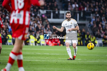 2024-01-21 - Nacho Fernandez of Real Madrid seen in action with the ball during the La Liga EA Sports 23/24 football match between Real Madrid vs Almeria at Bernabeu stadium in Madrid, Spain. - REAL MADRID VS ALMERIA - SPANISH LA LIGA - SOCCER