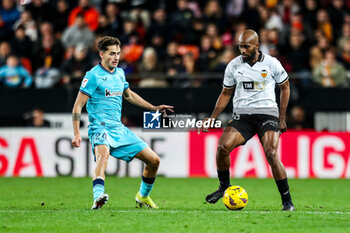 2024-01-20 - Dimitri Foulquier of Valencia and Benat Prados of Athletic Club during the Spanish championship La Liga football match between Valencia CF and Athletic Club on January 20, 2024 at Mestalla stadium in Valencia, Spain - FOOTBALL - SPANISH CHAMP - VALENCIA V ATHLETIC CLUB - SPANISH LA LIGA - SOCCER