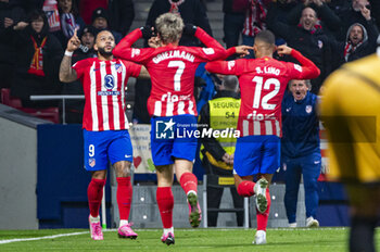 2024-01-31 - Antoine Griezmann (C) seen celebrating the goal of Memphis Depay (L) with Samuel Lino (R) of Atletico Madrid during the La Liga EA Sports 2023/24 football match between Atletico Madrid vs Rayo Vallecano at Metropolitano stadium in Madrid, Spain. - ATLETICO MADRID VS RAYO VALLECANO - SPANISH LA LIGA - SOCCER