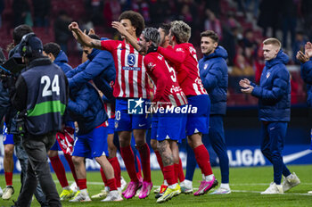 2024-01-31 - Antoine Griezmann, Rodrigo De Paul and Axel Witsel of Atletico Madrid seen celebrating the victory at the end of the La Liga EA Sports 2023/24 football match between Atletico Madrid vs Rayo Vallecano at Metropolitano stadium in Madrid, Spain. - ATLETICO MADRID VS RAYO VALLECANO - SPANISH LA LIGA - SOCCER