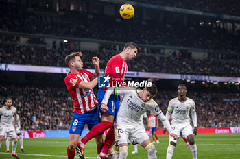 2024-02-04 - Saul Niguez and Alvaro Morata of Atletico Madrid seen taking the ball with the head during seen in action with the ball during the La Liga EA Sports 2023/24 football match between Real Madrid vs Atletico Madrid at Santiago Bernabeu stadium in Madrid, Spain. - REAL MADRID VS ATLETICO MADRID - SPANISH LA LIGA - SOCCER