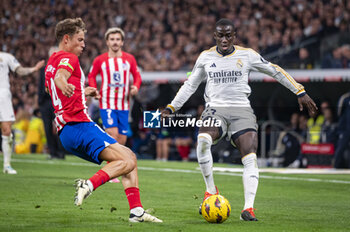 2024-02-04 - Ferland Mendy of Real Madrid seen in action with the ball during the La Liga EA Sports 2023/24 football match between Real Madrid vs Atletico Madrid at Santiago Bernabeu stadium in Madrid, Spain. - REAL MADRID VS ATLETICO MADRID - SPANISH LA LIGA - SOCCER