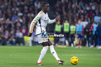 2024-02-04 - Ferland Mendy of Real Madrid seen in action with the ball during the La Liga EA Sports 2023/24 football match between Real Madrid vs Atletico Madrid at Santiago Bernabeu stadium in Madrid, Spain. - REAL MADRID VS ATLETICO MADRID - SPANISH LA LIGA - SOCCER