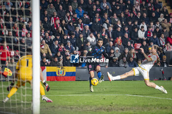 2024-02-05 - Yousseff En Nesyri of Sevilla (C) seen in action against Stole Dimitrievski of Rayo Vallecano (L) and Florian Lejeune of Rayo Vallecano (R) during the La Liga EA Sports 2023/24 football match between Rayo Vallecano vs Sevilla at Estadio Vallecas in Madrid, Spain. - RAYO VALLECANO VS SEVILLA - SPANISH LA LIGA - SOCCER