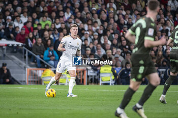2024-02-10 - Toni Kroos of Real Madrid seen in action with the ball during the La Liga EA Sports 2023/24 football match between Real Madrid vs Girona Madrid at Santiago Bernabeu stadium in Madrid, Spain. - REAL MADRID VS GIRONA - SPANISH LA LIGA - SOCCER