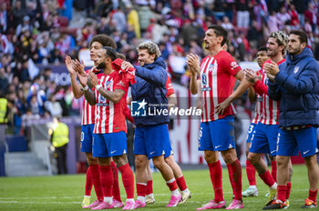 2024-02-17 - Atletico Madrid players (from L to R) Memphis Depay, Antoine Griezmann and Stefan Savic of Atletico Madrid seen cheering the fans at the end of the La Liga EA Sports 2023/24 football match between Atletico Madrid vs Las Palmas at Metropolitano stadium in Madrid, Spain. - ATLETICO MADRID VS LAS PALMAS - SPANISH LA LIGA - SOCCER