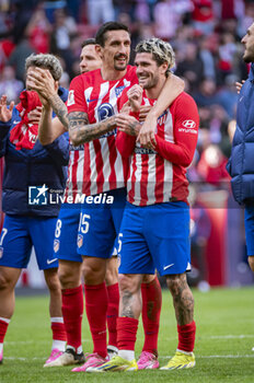 2024-02-17 - Atletico Madrid players (from L to R) Stefan Savic and Rodrigo De Paul of Atletico Madrid seen cheering the fans at the end of the La Liga EA Sports 2023/24 football match between Atletico Madrid vs Las Palmas at Metropolitano stadium in Madrid, Spain. - ATLETICO MADRID VS LAS PALMAS - SPANISH LA LIGA - SOCCER