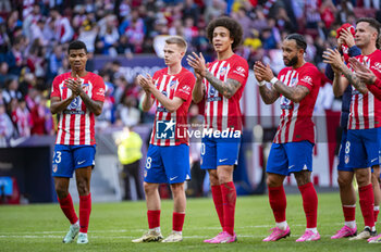 2024-02-17 - Atletico Madrid players (from L to R) Reinildo Mandava, Arthur Vermeerten, Axel Witsel and Memphis Depay of Atletico Madrid seen cheering the fans at the end of the La Liga EA Sports 2023/24 football match between Atletico Madrid vs Las Palmas at Metropolitano stadium in Madrid, Spain. - ATLETICO MADRID VS LAS PALMAS - SPANISH LA LIGA - SOCCER