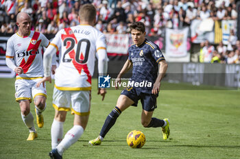 2024-02-18 - Fran Garcia of Real Madrid seen in action with the ball during the La Liga EA Sports 2023/24 football match between Rayo Vallecano vs Real Madrid at Estadio Vallecas in Madrid, Spain. - RAYO VALLECANO VS REAL MADRID - SPANISH LA LIGA - SOCCER