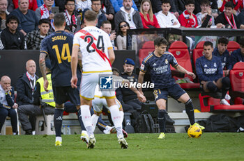 2024-02-18 - Brahim Diaz of Real Madrid seen in action with the ball during the La Liga EA Sports 2023/24 football match between Rayo Vallecano vs Real Madrid at Estadio Vallecas in Madrid, Spain. - RAYO VALLECANO VS REAL MADRID - SPANISH LA LIGA - SOCCER