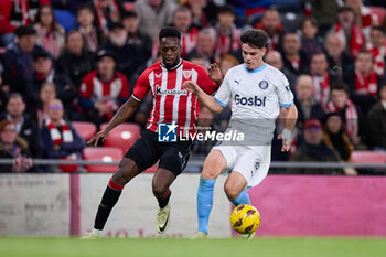 2024-02-19 - Inaki Williams of Athletic Club competes for the ball with Miguel Gutierrez of Girona FC during the Spanish championship La Liga football match between Athletic Club and Girona FC on February 19, 2024 at San Mames stadium in Bilbao, Spain - FOOTBALL - SPANISH CHAMP - ATHLETIC CLUB V GIRONA - SPANISH LA LIGA - SOCCER
