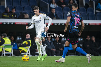 2024-02-25 - Federico Valverde of Real Madrid seen in action with the ball during the La Liga EA Sports 2023/24 football match between Real Madrid vs Sevilla at Santiago Bernabeu stadium in Madrid, Spain. - REAL MADRID VS SEVILLA - SPANISH LA LIGA - SOCCER