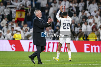 2024-02-25 - Carlo Ancelotti, coach of Real Madrid seen greeting the fans at the end of the La Liga EA Sports 2023/24 football match between Real Madrid vs Sevilla at Santiago Bernabeu stadium in Madrid, Spain. - REAL MADRID VS SEVILLA - SPANISH LA LIGA - SOCCER