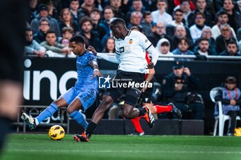 2024-03-03 - Rodrygo Goes of Real Madrid and Mouctar Diakhaby of Valencia during the Spanish championship Liga football match between Valencia CF and Real Madrid CF on March 2, 2024 at Mestalla stadium in Valencia, Spain - FOOTBALL - SPANISH CHAMP - VALENCIA V REAL MADRID - SPANISH LA LIGA - SOCCER