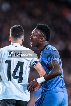 2024-03-03 - Vinicius Junior of Real Madrid and José Luis Gayà of Valencia during the Spanish championship Liga football match between Valencia CF and Real Madrid CF on March 2, 2024 at Mestalla stadium in Valencia, Spain - FOOTBALL - SPANISH CHAMP - VALENCIA V REAL MADRID - SPANISH LA LIGA - SOCCER