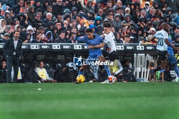 2024-03-03 - Jude Bellingham of Real Madrid and José Luis Pepelu of Valencia during the Spanish championship Liga football match between Valencia CF and Real Madrid CF on March 2, 2024 at Mestalla stadium in Valencia, Spain - FOOTBALL - SPANISH CHAMP - VALENCIA V REAL MADRID - SPANISH LA LIGA - SOCCER