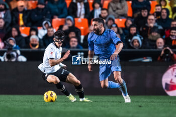 2024-03-03 - Dani Carvajal of Real Madrid and Diego López of Valencia during the Spanish championship Liga football match between Valencia CF and Real Madrid CF on March 2, 2024 at Mestalla stadium in Valencia, Spain - FOOTBALL - SPANISH CHAMP - VALENCIA V REAL MADRID - SPANISH LA LIGA - SOCCER
