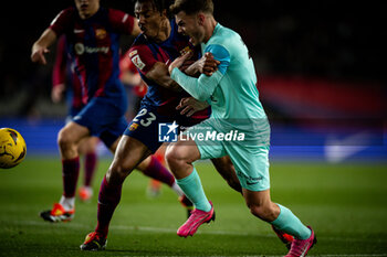 2024-03-08 - Lato (RCD Mallorca) and Jules Kounde (FC Barcelona) during a La Liga EA Sports match between FC Barcelona and RCD Mallorca at Estadi Olimpic Lluis Companys, in Barcelona, ,Spain on March 8, 2024. Photo by Felipe Mondino - FC BARCELONA - RCD MALLORCA - SPANISH LA LIGA - SOCCER