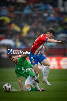 2024-03-31 - Guido Rodriguez (Betis) and Tsygankov (Girona FC) during a La Liga EA Sports match between Girona FC and Real Betis at Estadio Municipal de Montilivi, in Girona, ,Spain on March 31, 2024. Photo by Felipe Mondino - GIRONA FC - REAL BETIS - SPANISH LA LIGA - SOCCER