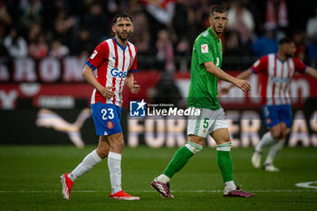 2024-03-31 - Ivan Martin (Girona FC) and Guido Rodriguez (Betis) during a La Liga EA Sports match between Girona FC and Real Betis at Estadio Municipal de Montilivi, in Girona, ,Spain on March 31, 2024. Photo by Felipe Mondino - GIRONA FC - REAL BETIS - SPANISH LA LIGA - SOCCER