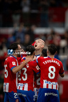 2024-03-31 - Dovbyk (Girona FC) celebrates after scoring his team's goal with team mates during a La Liga EA Sports match between Girona FC and Real Betis at Estadio Municipal de Montilivi, in Girona, ,Spain on March 31, 2024. Photo by Felipe Mondino - GIRONA FC - REAL BETIS - SPANISH LA LIGA - SOCCER