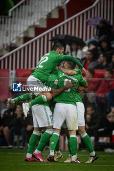 2024-03-31 - William Jose (Betis) celebrates after scoring his team's goal with team mates during a La Liga EA Sports match between Girona FC and Real Betis at Estadio Municipal de Montilivi, in Girona, ,Spain on March 31, 2024. Photo by Felipe Mondino - GIRONA FC - REAL BETIS - SPANISH LA LIGA - SOCCER