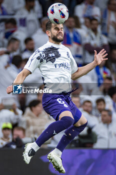 2024-03-31 - Nacho Fernandez of Real Madrid seen taking the ball with his head during the warming up before the La Liga EA Sports 2023/24 football match between Real Madrid vs Athletic Club Bilbao at Santiago Bernabeu stadium in Madrid, Spain. - REAL MADRID VS ATHLETIC CLUB BILBAO - SPANISH LA LIGA - SOCCER