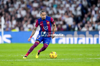 2024-04-21 - Raphinha of FC Barcelona during the Spanish championship La Liga football match between Real Madrid and FC Barcelona on April 21, 2024 at Santiago Bernabeu stadium in Madrid, Spain - FOOTBALL - SPANISH CHAMP - REAL MADRID V FC BARCELONA - SPANISH LA LIGA - SOCCER