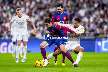 2024-04-21 - Andreas Christensen of FC Barcelona and Jude Bellingham of Real Madrid during the Spanish championship La Liga football match between Real Madrid and FC Barcelona on April 21, 2024 at Santiago Bernabeu stadium in Madrid, Spain - FOOTBALL - SPANISH CHAMP - REAL MADRID V FC BARCELONA - SPANISH LA LIGA - SOCCER