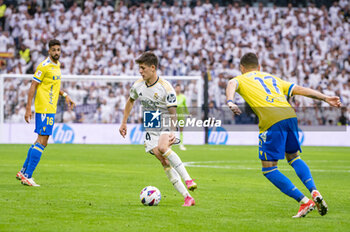 2024-05-04 - MADRID, SPAIN - MAY 04: Arda Guler of Real Madrid seen in action with the ball during the La Liga EA Sports 2023/24 football match between Real Madrid vs Cadiz CF at Estadio Santiago Bernabeu on May 04, 2024 in Madrid, Spain. - REAL MADRID VS CADIZ - SPANISH LA LIGA - SOCCER