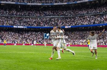 2024-05-04 - MADRID, SPAIN - MAY 04: Jose Luis Sanmartin Mato (Joselu) of Real Madrid (L) and Nacho Fernandez of Real Madrid (R) seen celebrating a goal during the La Liga EA Sports 2023/24 football match between Real Madrid vs Cadiz CF at Estadio Santiago Bernabeu on May 04, 2024 in Madrid, Spain. - REAL MADRID VS CADIZ - SPANISH LA LIGA - SOCCER