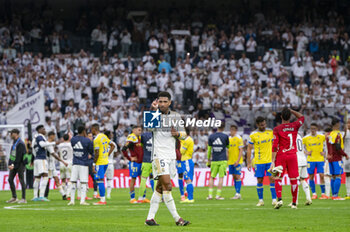 2024-05-04 - MADRID, SPAIN - MAY 04: Jude Bellingham of Real Madrid makes a gesture to the fans during the La Liga EA Sports 2023/24 football match between Real Madrid vs Cadiz CF at Estadio Santiago Bernabeu on May 04, 2024 in Madrid, Spain. - REAL MADRID VS CADIZ - SPANISH LA LIGA - SOCCER