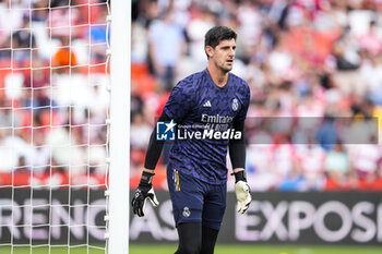 2024-05-11 - Thibaut Courtois of Real Madrid warms up during the Spanish championship La Liga football match between Granada CF and Real Madrid on May 11, 2024 at Los Carmenes stadium in Granada, Spain - FOOTBALL - SPANISH CHAMP - GRANADA V REAL MADRID - SPANISH LA LIGA - SOCCER