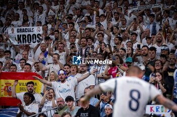 2024-05-25 - Real Madrid fans seen celebrating Toni Kroos of Real Madrid during the La Liga EA Sports 2023/24 football match between Real Madrid vs Real Betis at Estadio Santiago Bernabeu on May 25, 2024 in Madrid, Spain. - REAL MADRID VS REAL BETIS - SPANISH LA LIGA - SOCCER