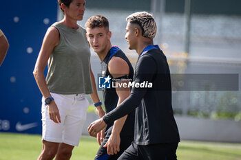 2024-07-19 - Marc Casado (FC Barcelona) and Julian Araujo (FC Barcelona) gestures during a FC Barcelona training session at Ciutat Esportiva Joan Gamper in Barcelona, Spain, on July 19 2024. Photo by Felipe Mondino - FC BARCLEONA TRAINING SESSION - SPANISH LA LIGA - SOCCER