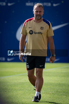 2024-07-19 - Head Coach Hans Flick (FC Barcelona) gestures during a FC Barcelona training session at Ciutat Esportiva Joan Gamper in Barcelona, Spain, on July 19 2024. Photo by Felipe Mondino - FC BARCLEONA TRAINING SESSION - SPANISH LA LIGA - SOCCER