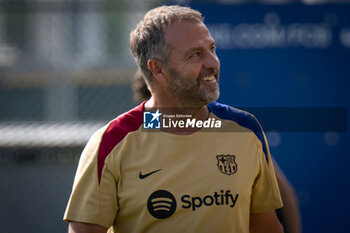 2024-07-19 - Head Coach Hans Flick (FC Barcelona) gestures during a FC Barcelona training session at Ciutat Esportiva Joan Gamper in Barcelona, Spain, on July 19 2024. Photo by Felipe Mondino - FC BARCLEONA TRAINING SESSION - SPANISH LA LIGA - SOCCER