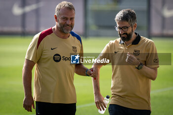 2024-07-19 - Head Coach Hans Flick (FC Barcelona) gestures during a FC Barcelona training session at Ciutat Esportiva Joan Gamper in Barcelona, Spain, on July 19 2024. Photo by Felipe Mondino - FC BARCLEONA TRAINING SESSION - SPANISH LA LIGA - SOCCER