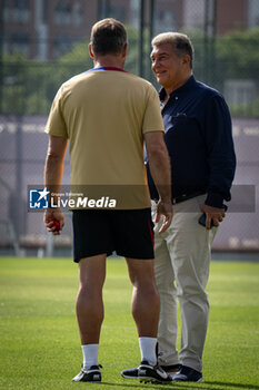 2024-07-19 - Head Coach Hans Flick (FC Barcelona) and FC Barcelona president Joan Laporta during a FC Barcelona training session at Ciutat Esportiva Joan Gamper in Barcelona, Spain, on July 19 2024. Photo by Felipe Mondino - FC BARCLEONA TRAINING SESSION - SPANISH LA LIGA - SOCCER