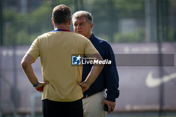 2024-07-19 - Head Coach Hans Flick (FC Barcelona) and FC Barcelona president Joan Laporta during a FC Barcelona training session at Ciutat Esportiva Joan Gamper in Barcelona, Spain, on July 19 2024. Photo by Felipe Mondino - FC BARCLEONA TRAINING SESSION - SPANISH LA LIGA - SOCCER