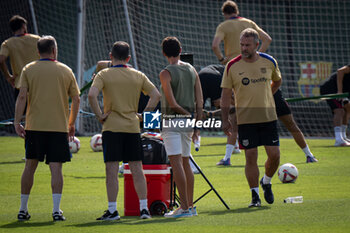 2024-07-19 - Head Coach Hans Flick (FC Barcelona) looks on during a FC Barcelona training session at Ciutat Esportiva Joan Gamper in Barcelona, Spain, on July 19 2024. Photo by Felipe Mondino - FC BARCLEONA TRAINING SESSION - SPANISH LA LIGA - SOCCER