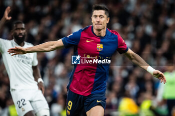 2024-10-26 - Robert LEWANDOWSKI of Barcelona celebrates his goal during the Spanish championship La Liga football match between Real Madrid CF and FC Barcelona on October 26, 2024 at Santiago Bernabeu stadium in Madrid, Spain - FOOTBALL - SPANISH CHAMP - REAL MADRID V FC BARCELONA - SPANISH LA LIGA - SOCCER