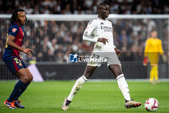 2024-10-26 - Jules KOUNDE of Barcelona and Ferland MENDY of Real Madrid during the Spanish championship La Liga football match between Real Madrid CF and FC Barcelona on October 26, 2024 at Santiago Bernabeu stadium in Madrid, Spain - FOOTBALL - SPANISH CHAMP - REAL MADRID V FC BARCELONA - SPANISH LA LIGA - SOCCER