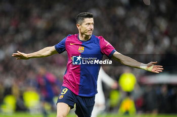 2024-10-26 - Robert Lewandowski of FC Barcelona celebrates a goal during the Spanish championship La Liga football match between Real Madrid CF and FC Barcelona on 26 October 2024 at Santiago Bernabeu stadium in Madrid, Spain - FOOTBALL - SPANISH CHAMP - REAL MADRID V FC BARCELONA - SPANISH LA LIGA - SOCCER