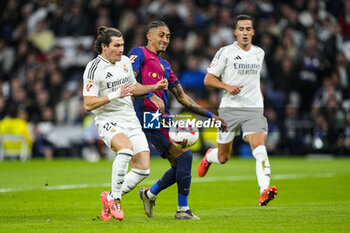 2024-10-26 - Fran García of Real Madrid and Raphael Dias "Raphinha" of FC Barcelona during the Spanish championship La Liga football match between Real Madrid CF and FC Barcelona on 26 October 2024 at Santiago Bernabeu stadium in Madrid, Spain - FOOTBALL - SPANISH CHAMP - REAL MADRID V FC BARCELONA - SPANISH LA LIGA - SOCCER