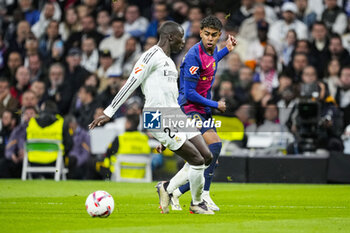 2024-10-26 - Lamine Yamal of FC Barcelona and Ferland Mendy of Real Madrid during the Spanish championship La Liga football match between Real Madrid CF and FC Barcelona on 26 October 2024 at Santiago Bernabeu stadium in Madrid, Spain - FOOTBALL - SPANISH CHAMP - REAL MADRID V FC BARCELONA - SPANISH LA LIGA - SOCCER