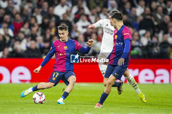 2024-10-26 - Marc Casado of FC Barcelona during the Spanish championship La Liga football match between Real Madrid CF and FC Barcelona on 26 October 2024 at Santiago Bernabeu stadium in Madrid, Spain - FOOTBALL - SPANISH CHAMP - REAL MADRID V FC BARCELONA - SPANISH LA LIGA - SOCCER